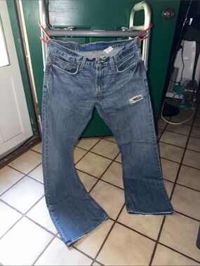 Levi 527 Women’s Boot Cut Denim Jeans Distressed